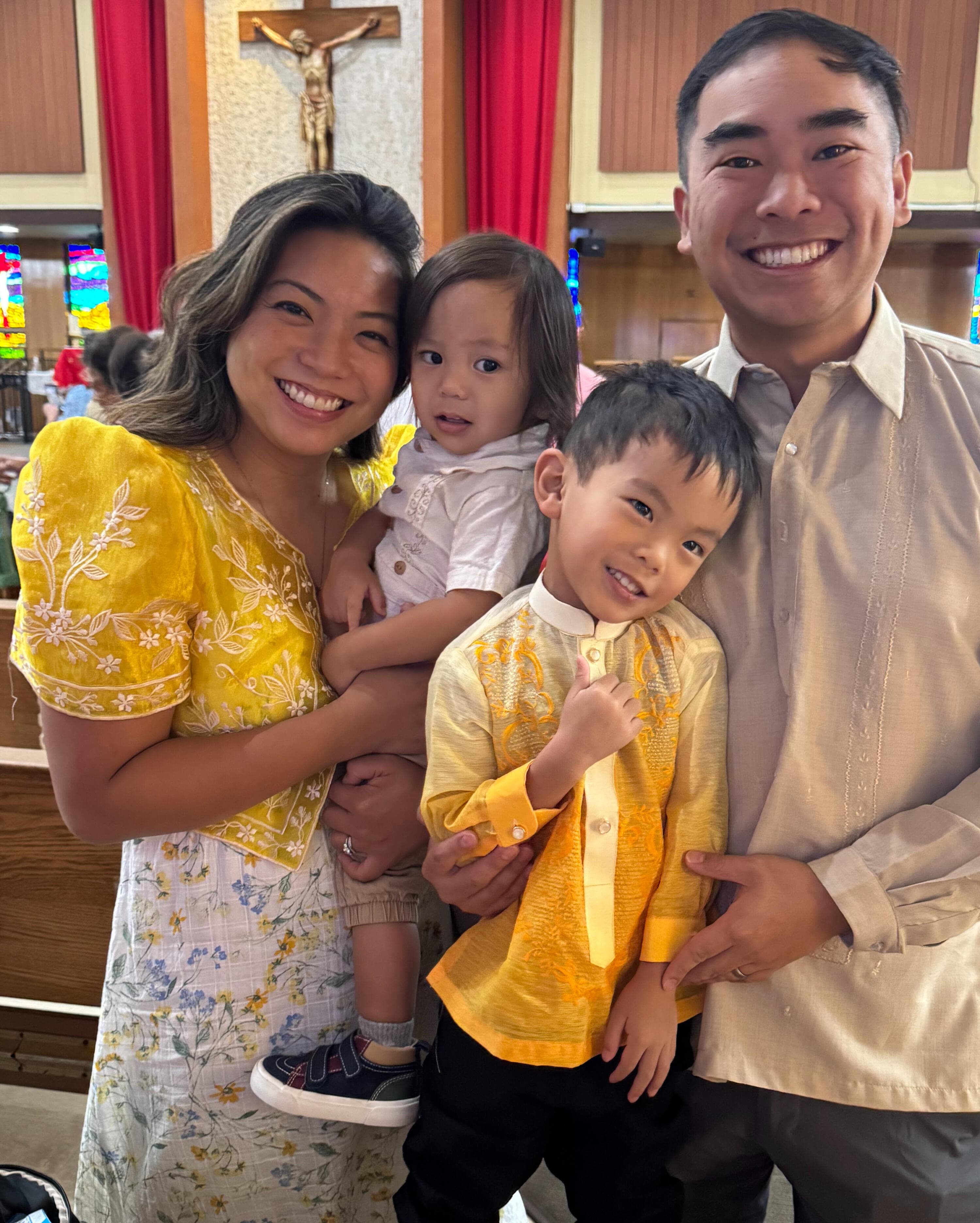 Ambergrace with her husband and two sons at church